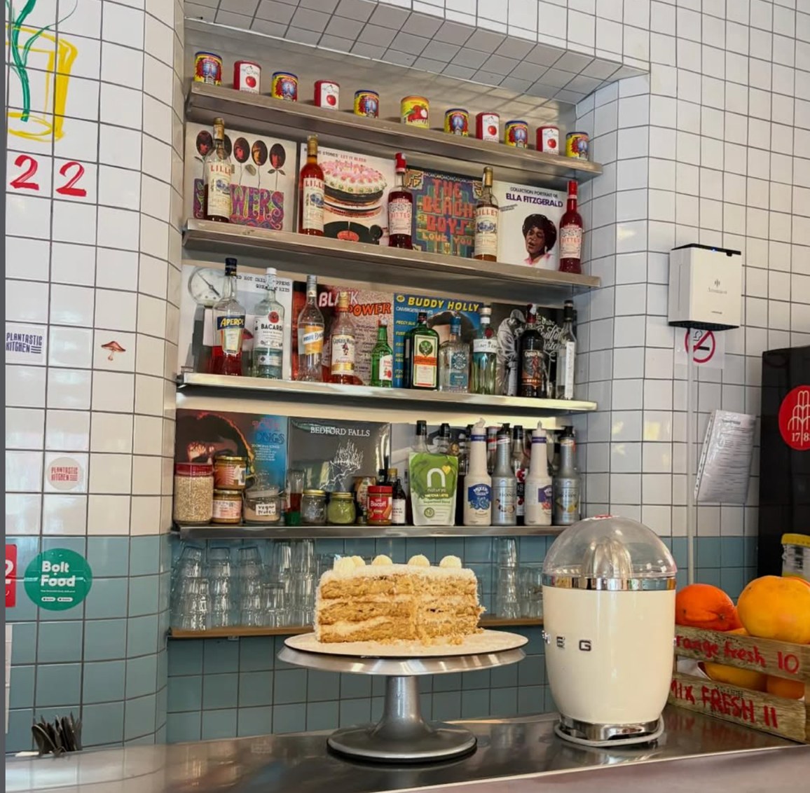 Plantastic Kitchen bar shelves and a slice of vegan honey cake